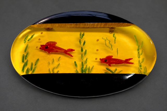 Shultz reverse carved fish pin